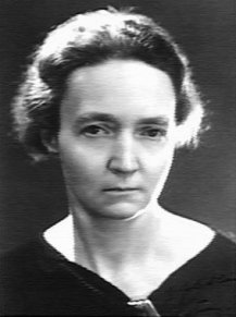 Why was Irène Joliot-Curie awarded Noble Prize in1935?